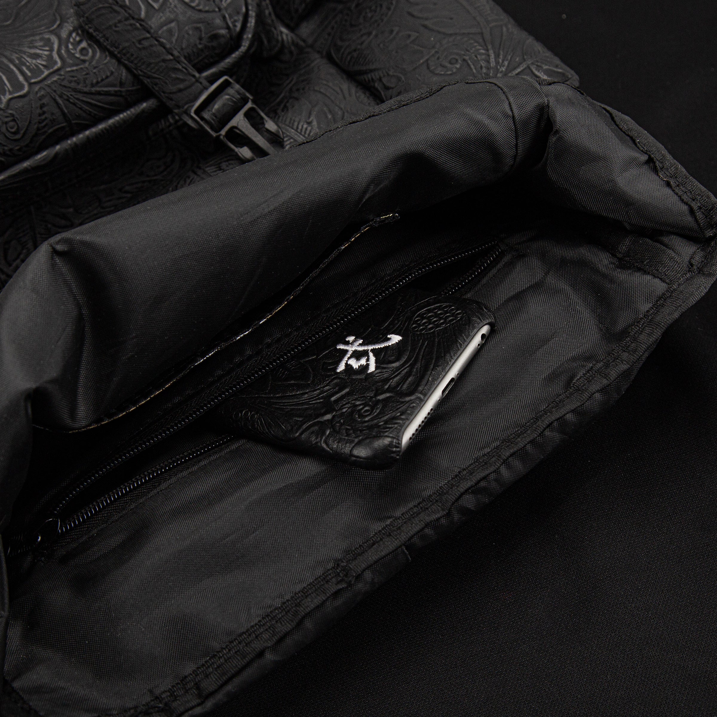 Laptop Backpack with Heavy-Duty Embroidery & Brass Lion-Head Ornament